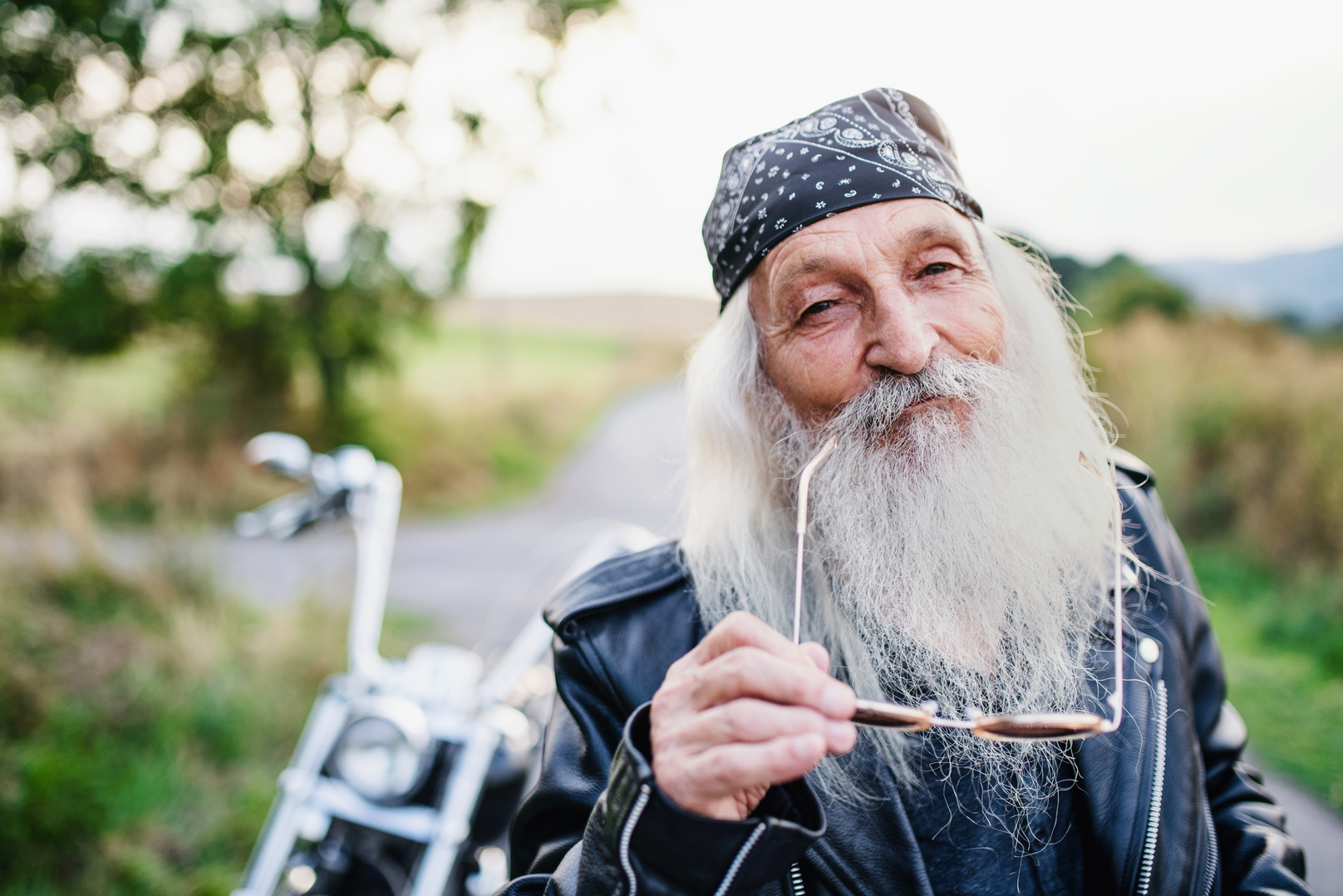 Old Man Traveling the World with a Motorcycle