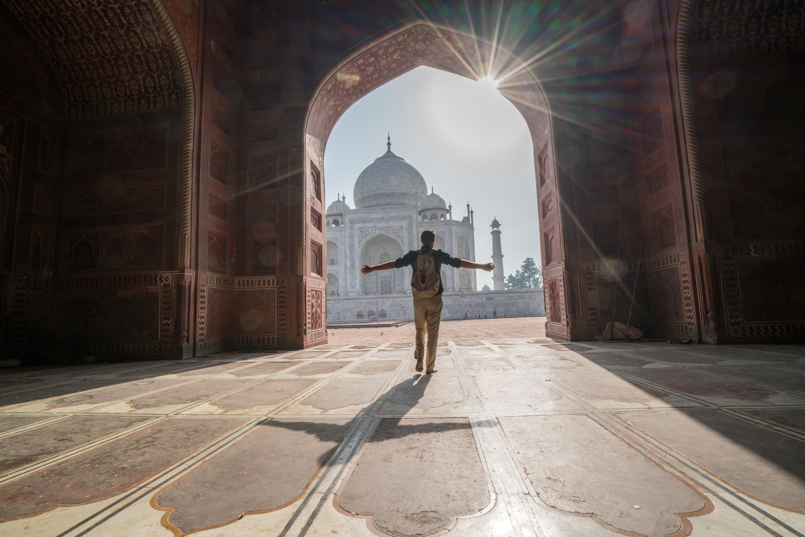 Happy travel man discovering India
